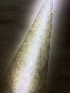 a beautiful patterned backlit triangle
