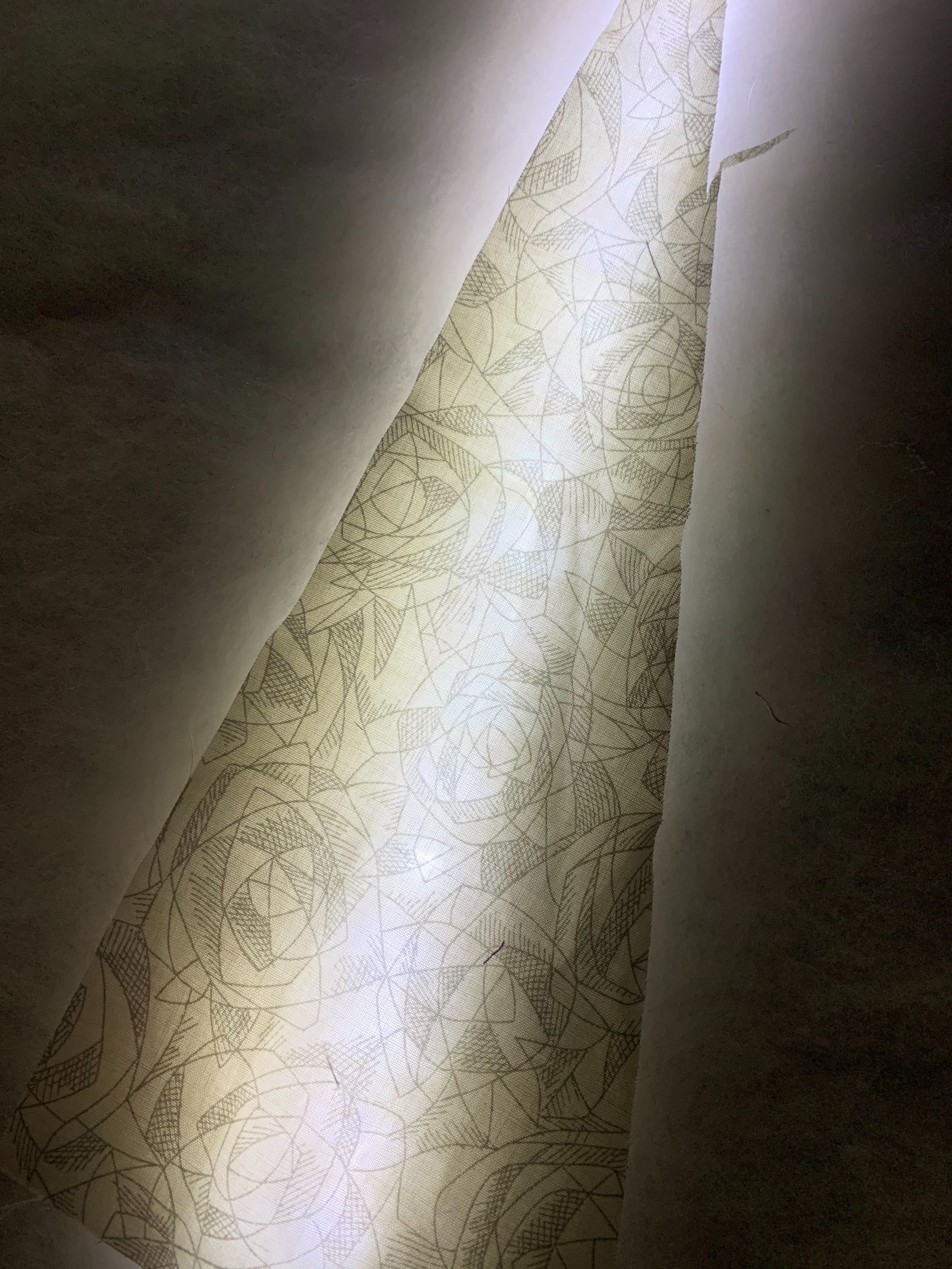 a beautiful patterned backlit triangle